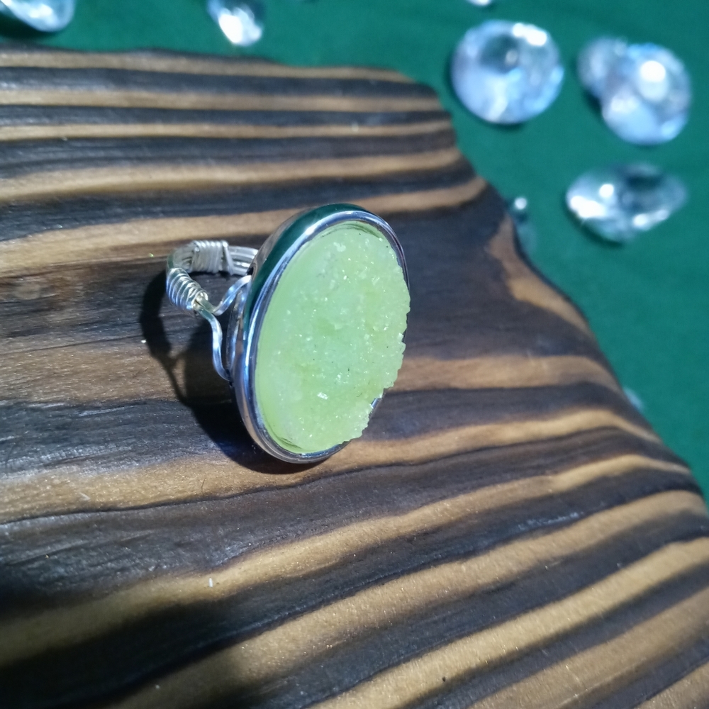 Silver ring with green bling
